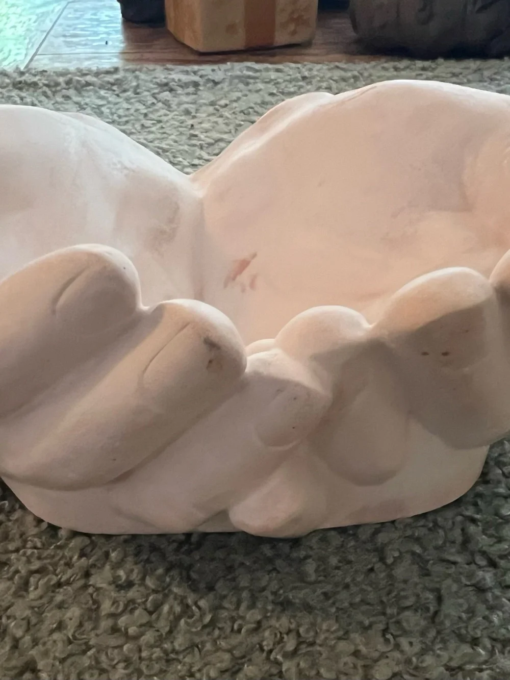 Giving Hands made of plaster of Paris and colored with white